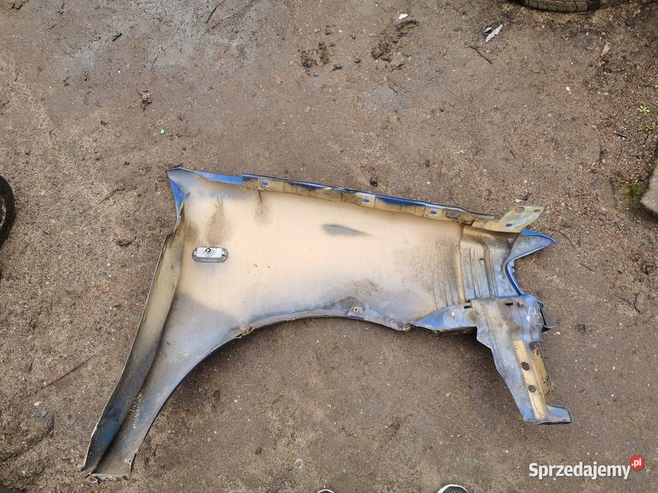 Blotnik przód lewy VOLKSWAGEN POLO 6n2 granatowy Margonin