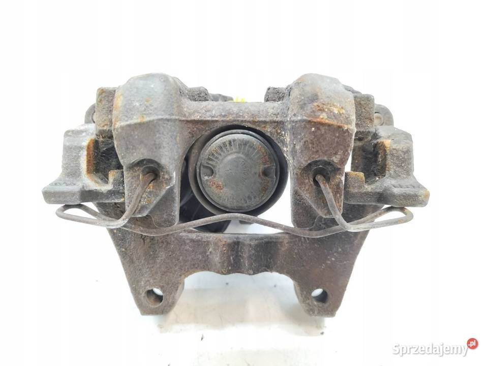 ZACISK HAMULCOWY PRAWY TYŁ 20 TDI 150 3Q0615406R osobowe