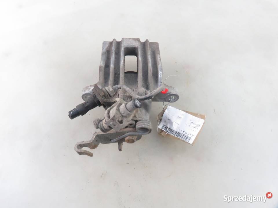 ZACISK LEWY TYŁ VW GOLF V 1K1 16 FSI BAG