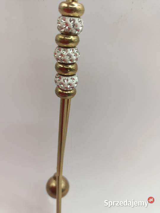 Naszyjnik z złotymi bombkami Zamość