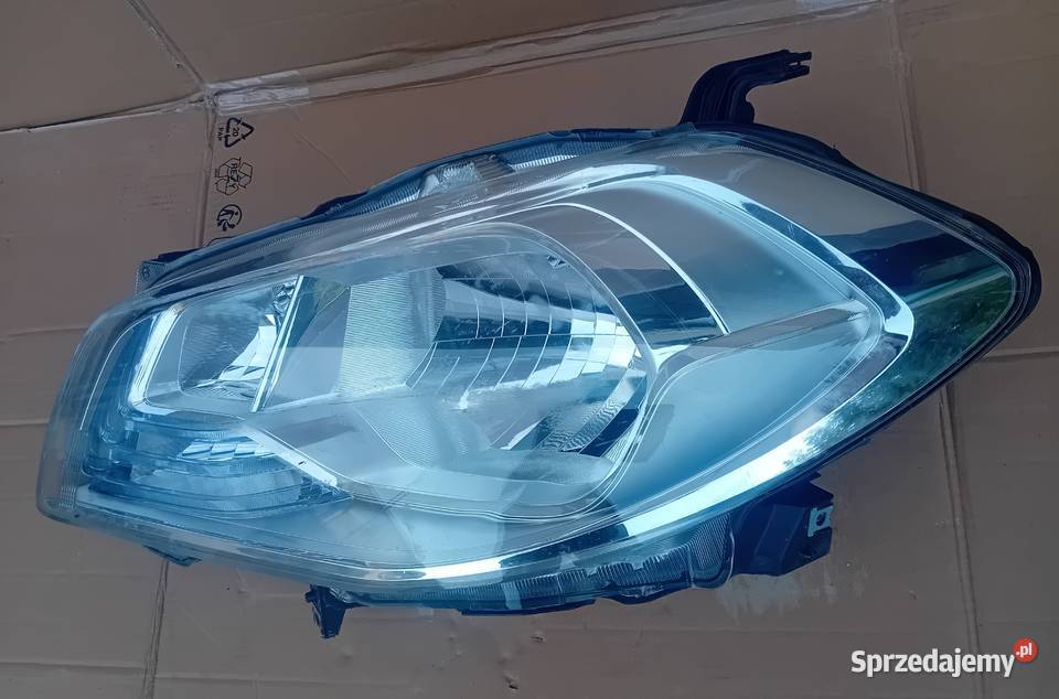 Suzuki SX4 Cross reflektor lampe lewy przód osobowe wielkopolskie Przeźmierowo