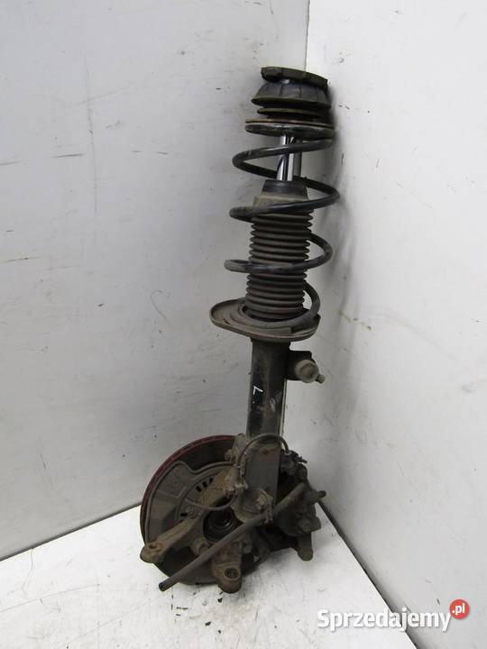 ZWROTNICA MCPHERSON LEWY PRZÓD 10 B SUZUKI SWIFT Zawieszenie i amortyzacja