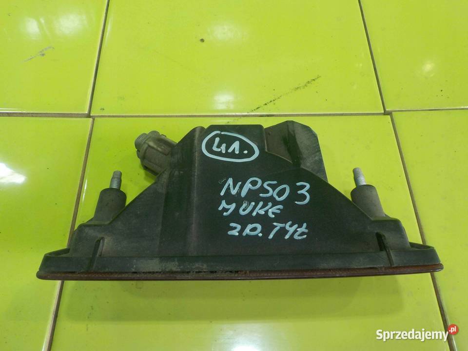 NISSAN JUKE I F15 11r lampa w zderzak tyl uniwersalne Suków