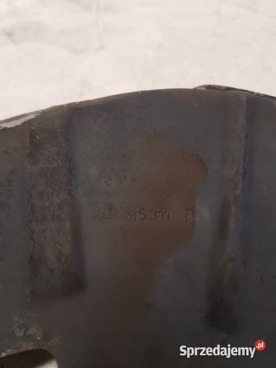 OSŁONA TARCZY LEWY PRZÓD AUDI Q7 7L0615311B Przystajń