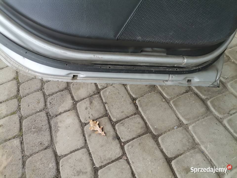 NISSAN PRIMERA P12 HB DRZWI LEWY TYŁ KY0G Nowy Sącz