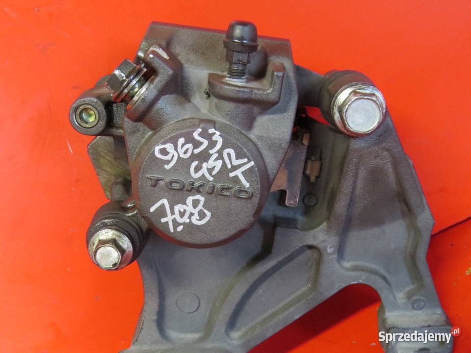SUZUKI GSR 600 GSR600 K10 09 zacisk hamulca