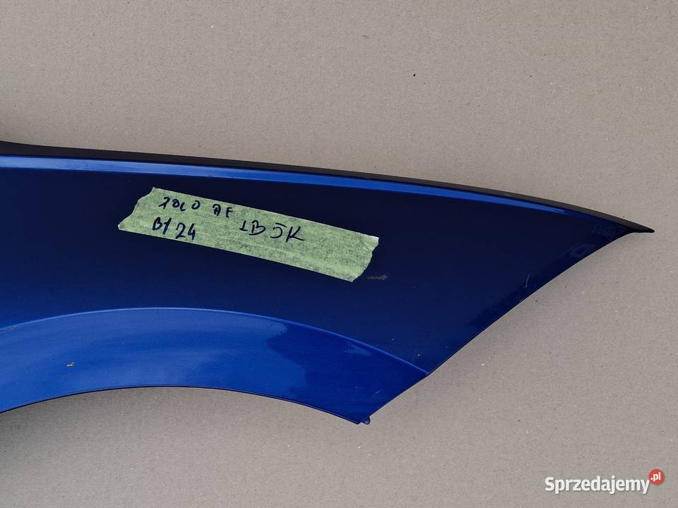 VW POLO 2G 17 BŁOTNIK PRZÓD PRZEDNI MASKOWNICA Bieleń