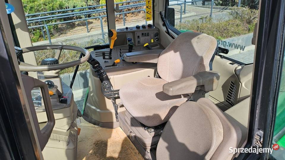 Ciągnik rolniczy John Deere 6115M z ładowaczem Jatutów