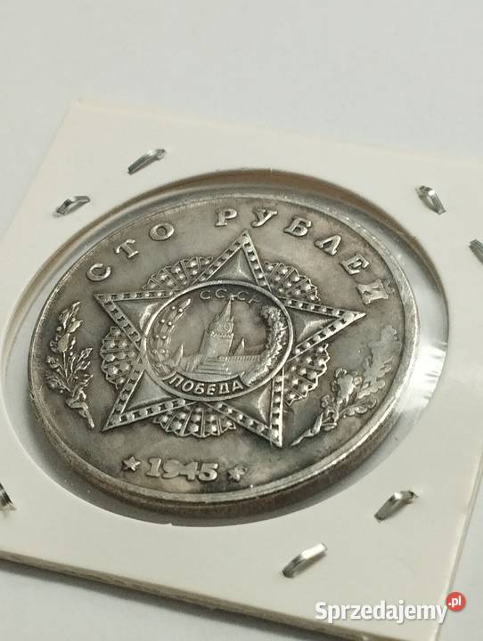 Sprzedam kopię monety w holderze Rosja 100 Rubli