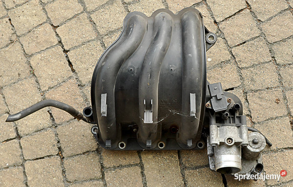 Kolektor ssący VW Polo 03D129766L z przepustnicą Silniki i osprzęt Kraków