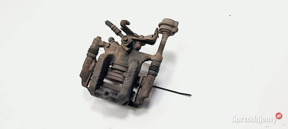 ZACISK HAMULCOWY TYŁ LEWY OPEL ASTRA J Lipno