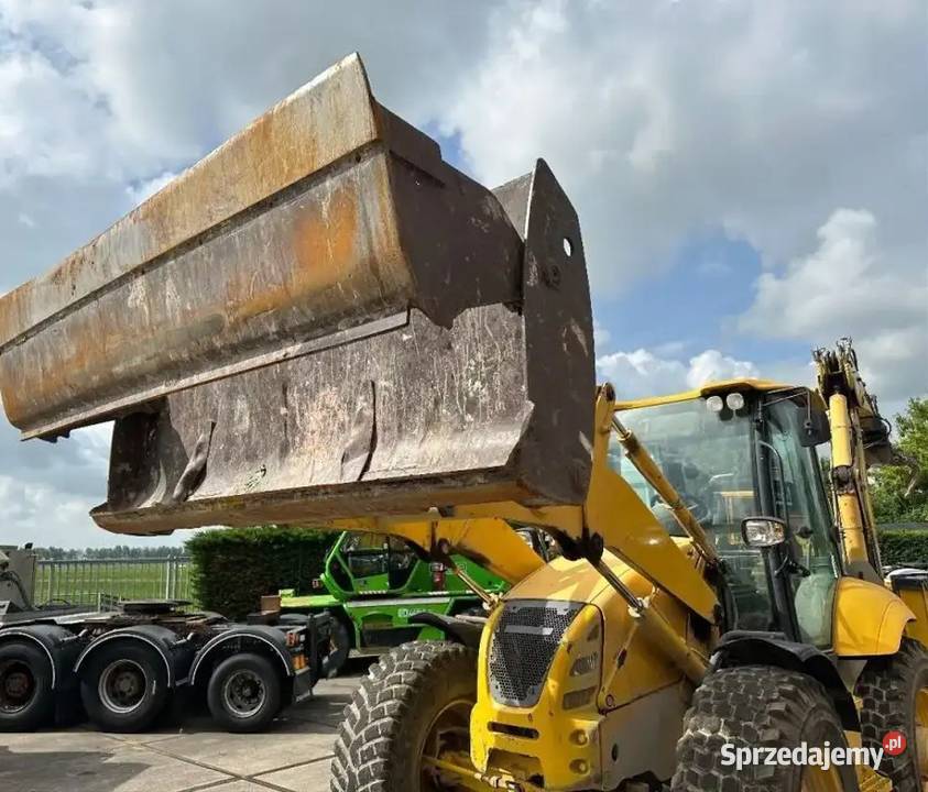 Koparko ladowarka kolowa Komatsu WB 97S tez