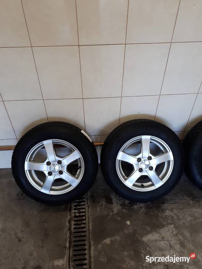 Sprzedam felgi aluminiowe z oponami 4x100R14 Opony, koła, felgi
