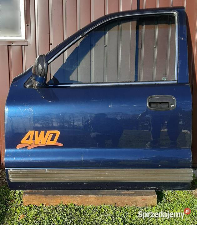 Lewy komplet drzwi Kia Sportage I przód tył