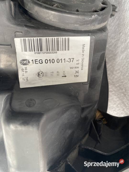 Lampa lewy przód Opel Astra IV lift 1215