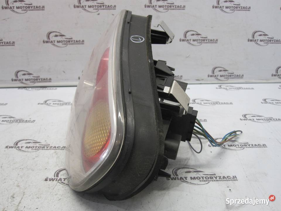 MINI COOPER I lampa lewa tył 716695703