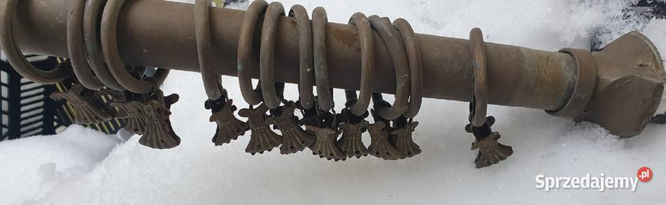 Zabytkowy mosiężny karnisz z żabkami Reszel