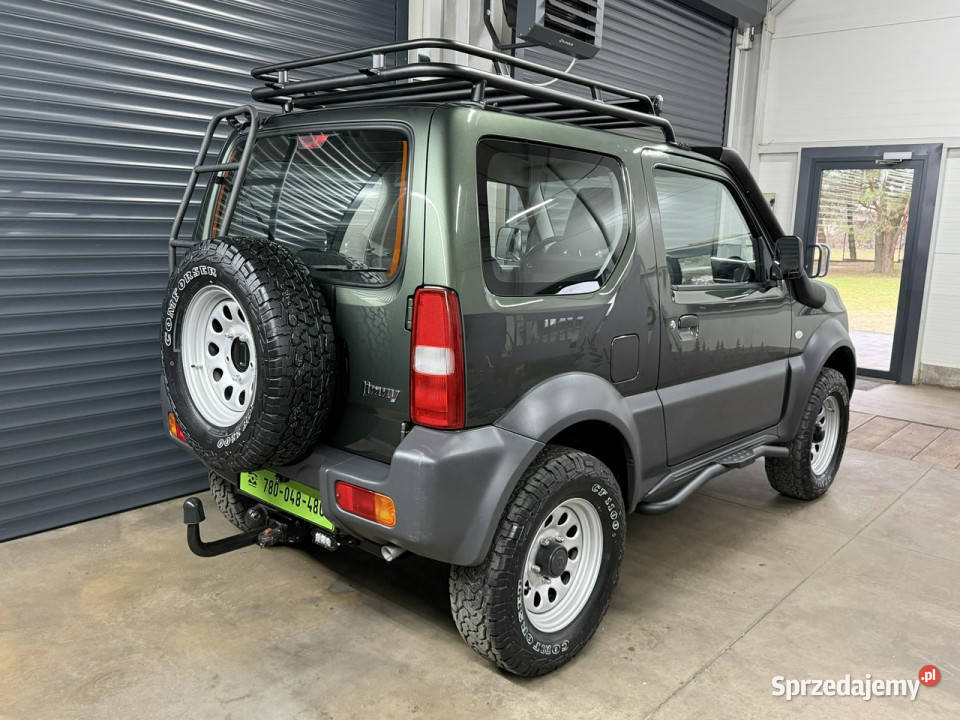 Suzuki Jimny 120tyśkm 2015r leśnika myśliwego zielony Chechło