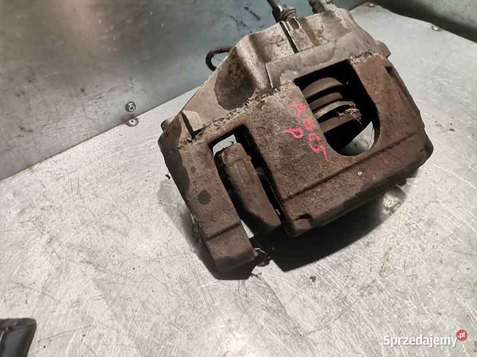 ZACISK 974 PRAWY PRZÓD AUDI A4 B6 A6 C5 LIFT POD Rok produkcji 2002 Części samochodowe Nowy Sącz