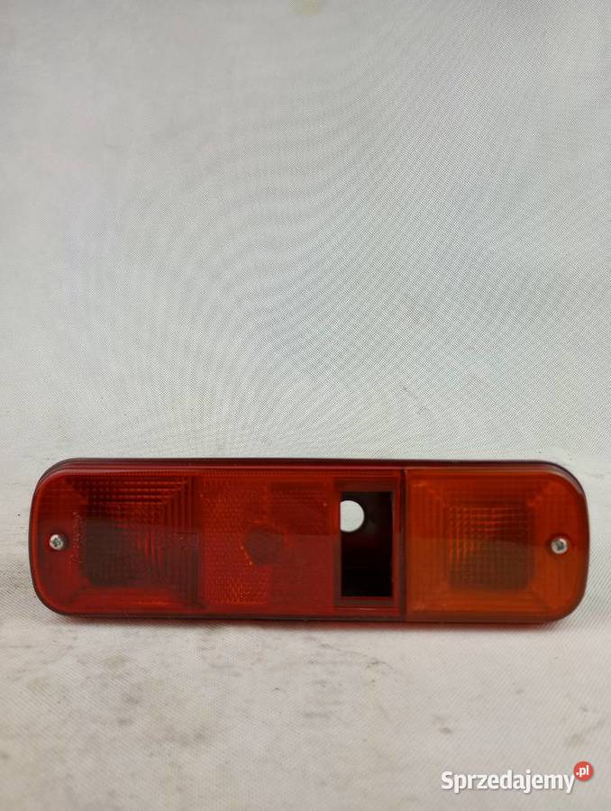 Lampa NH 82007634 TL TM TS nieuszkodzony Józefin