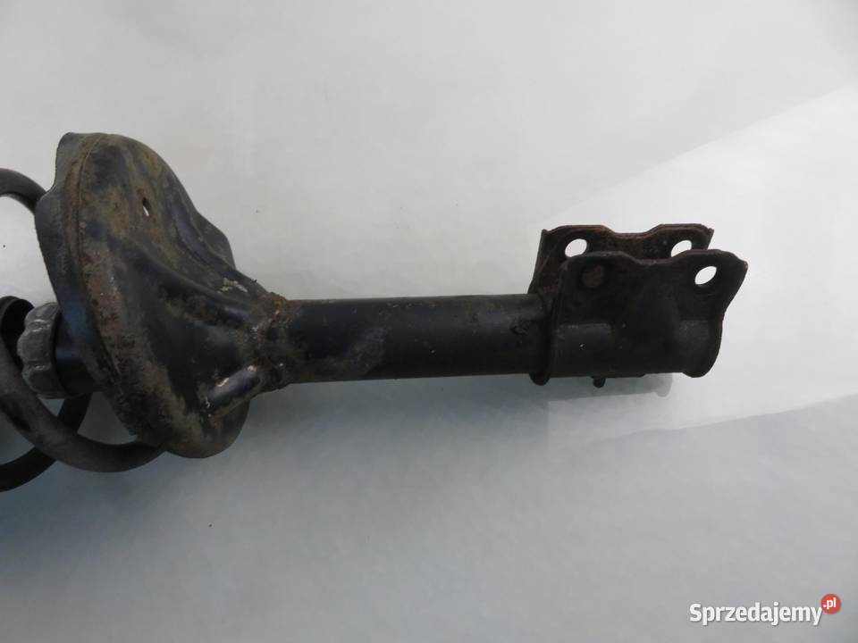 MCPERSON LEWY PRZEDNI MITSUBISHI OUTLANDER I 24 osobowe