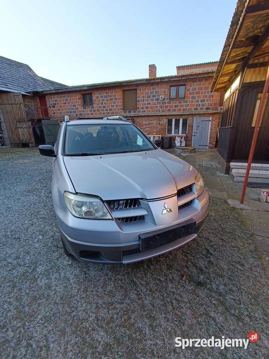 Mitsubishi Outlander 0308 lampy maska błotniki Książ Wielkopolski