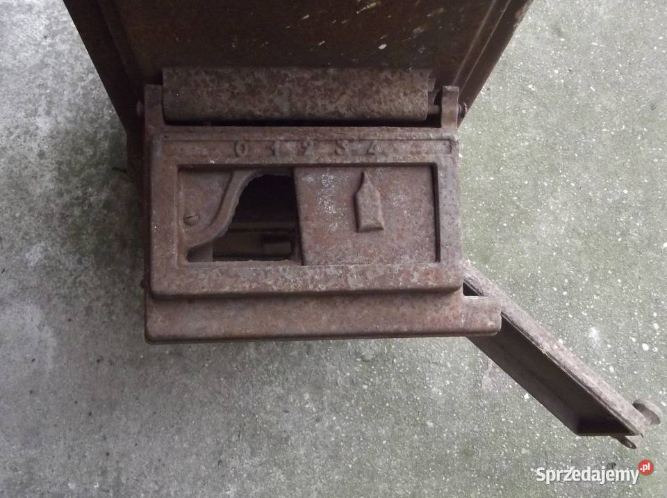 Piec typ koza używany stary żeliwny zabytkowy Pawonków