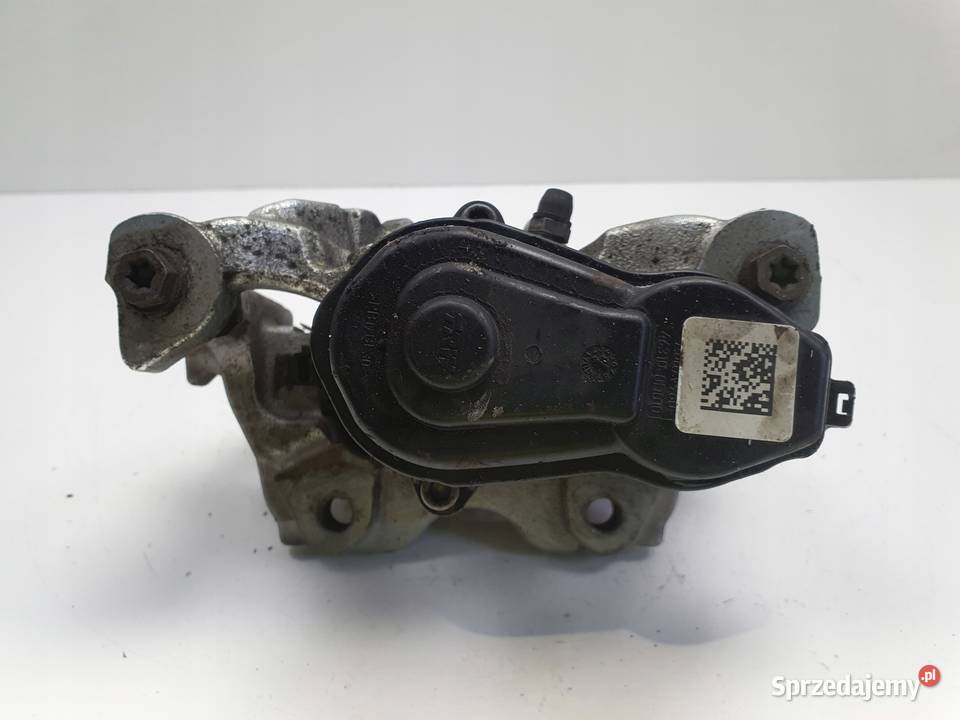 Toyota Yaris IV TYLNY ZACISK HAMULCOWY prawy tył Rudka