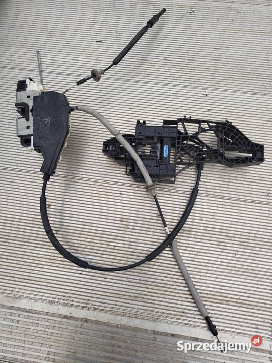 Zamek drzwi przednich LEWYCH DODGE P04589913AH osobowe Pozostałe Zielęcice
