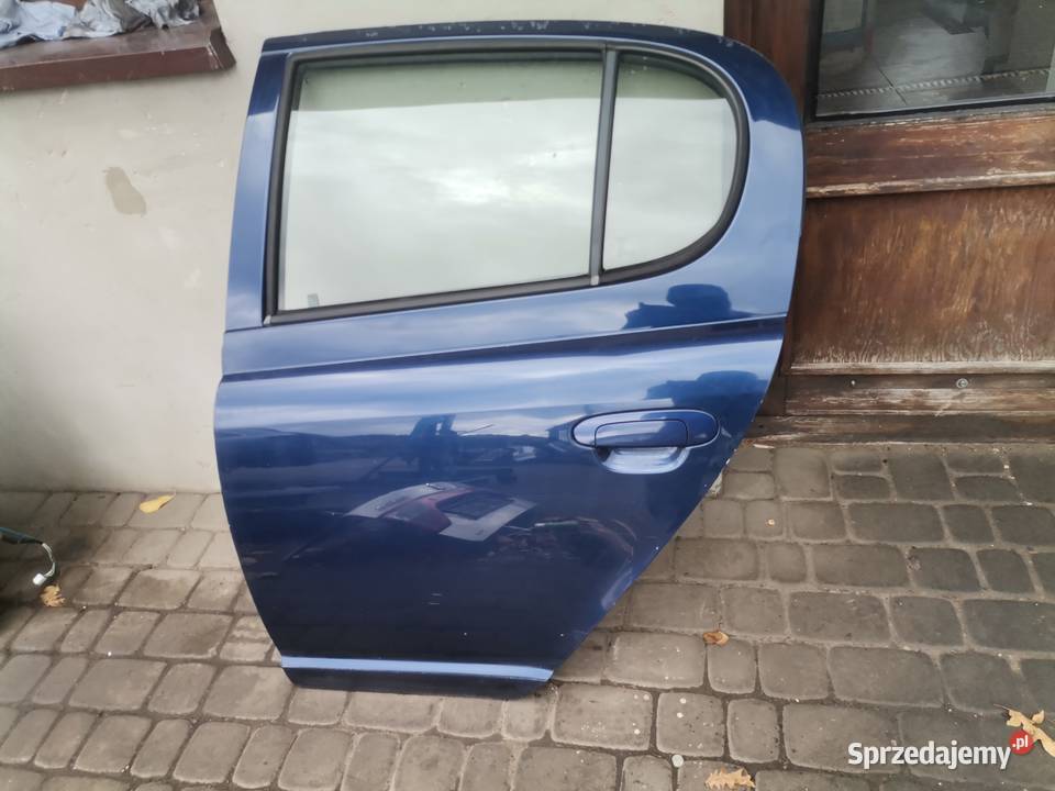 DRZWI LEWY TYŁ TOYOTA YARIS 1 8K8 Nowy Sącz