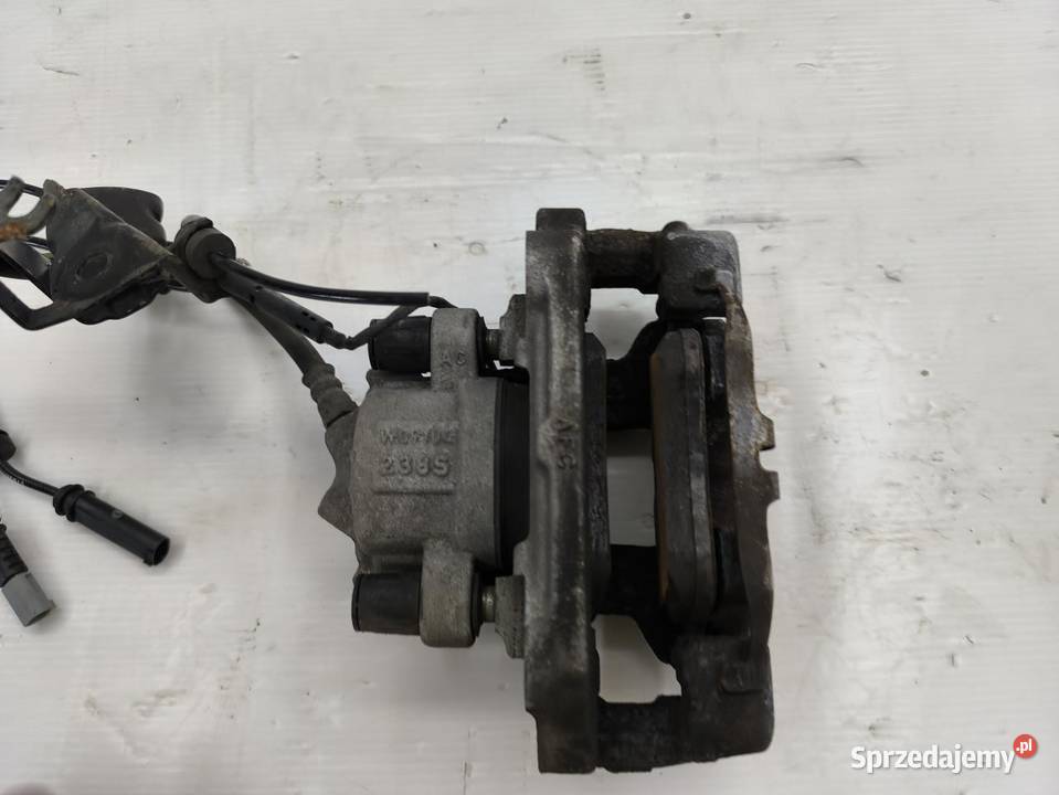 ZACISK LEWY PRZÓD BMW F20 16 116i 136 wielkopolskie