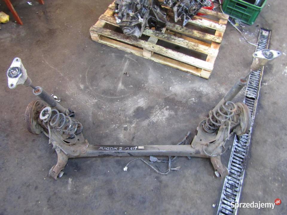 BELKA OŚ ZAWIESZENIA TYŁ TYLNA 15 B MAZDA 2 DJ