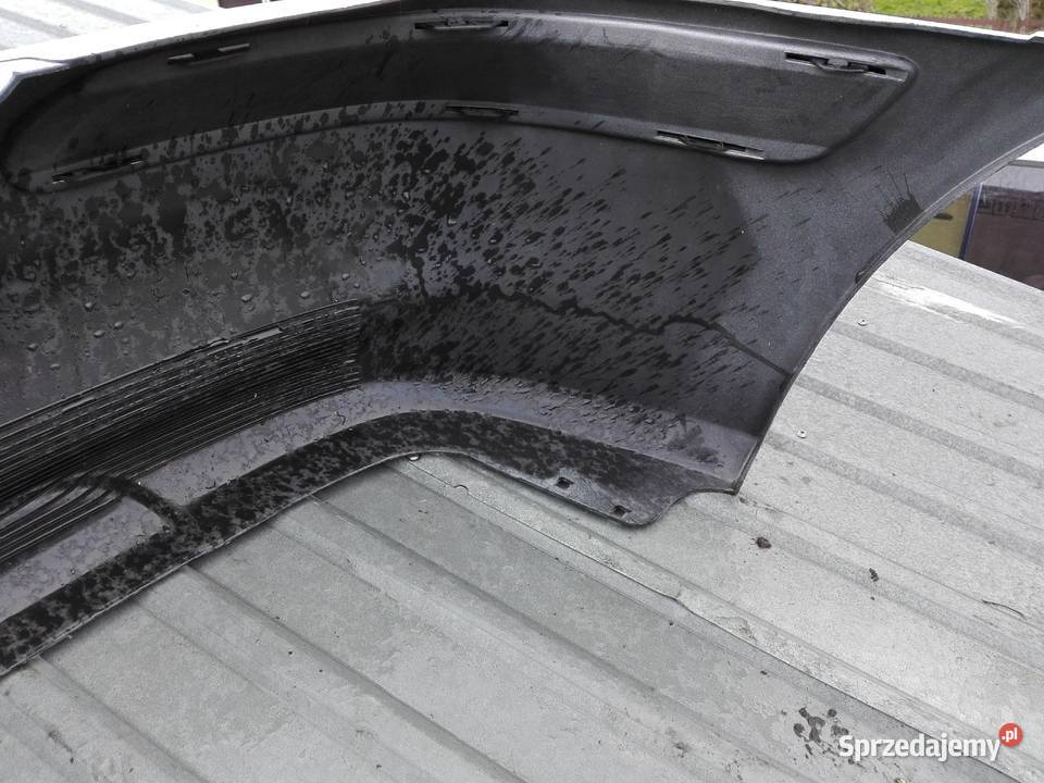 Nissan Almera N16 zderzak tylny srebrny