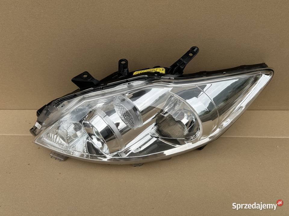 TOYOTA AURIS I LIFT 0912 8111002A40 Reflektor dolnośląskie Bolesławiec