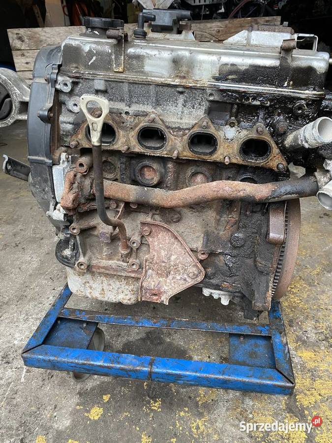 SILNIK SŁUPEK MITSUBISHI CARISMA COLT LANCER 16