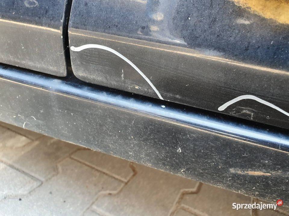 DRZWI PRAWE PRZÓD DAIHATSU SIRION osobowe Pozostałe Lipno