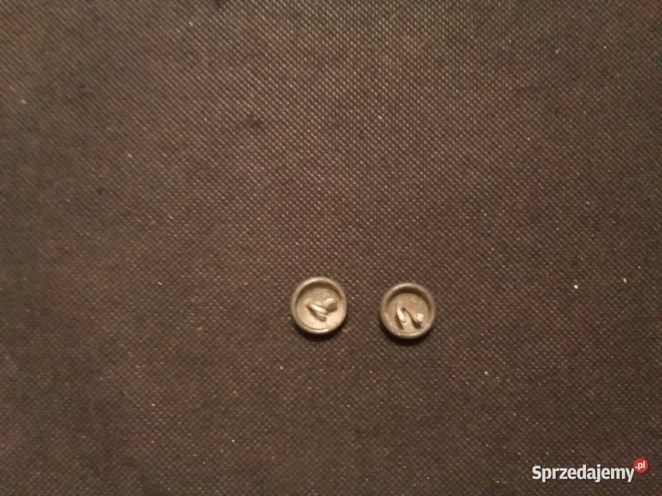 Małe guziki z orłem bez korony z wytarciem na Warszawa