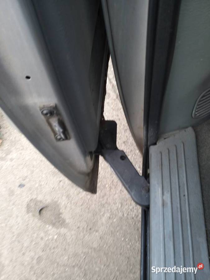 MECHANIZM DRZWI OTWIERANYCH ELEKTRYCZNIE