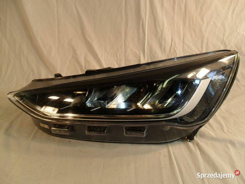 Reflektor Przód strona lewa Ford Focus MM125 Motoryzacja wielkopolskie Nowy Tomyśl