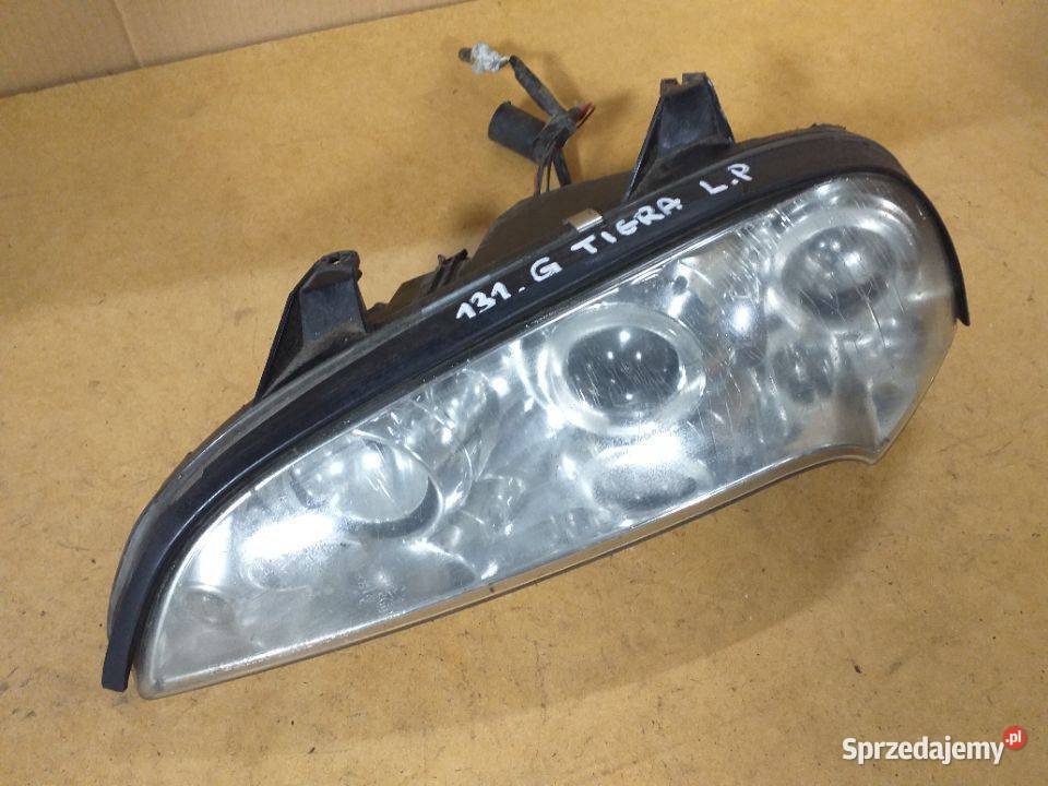 131G OPEL TIGRA Reflektor Lampa przednia lewa osobowe świętokrzyskie Włoszczowa