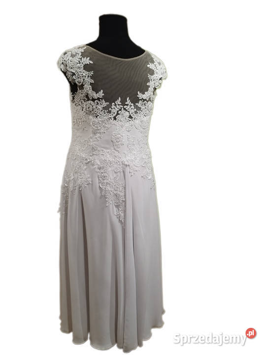 Wyjątkowa sukienka ślubna z Bridal cape 4XL48 Myszków