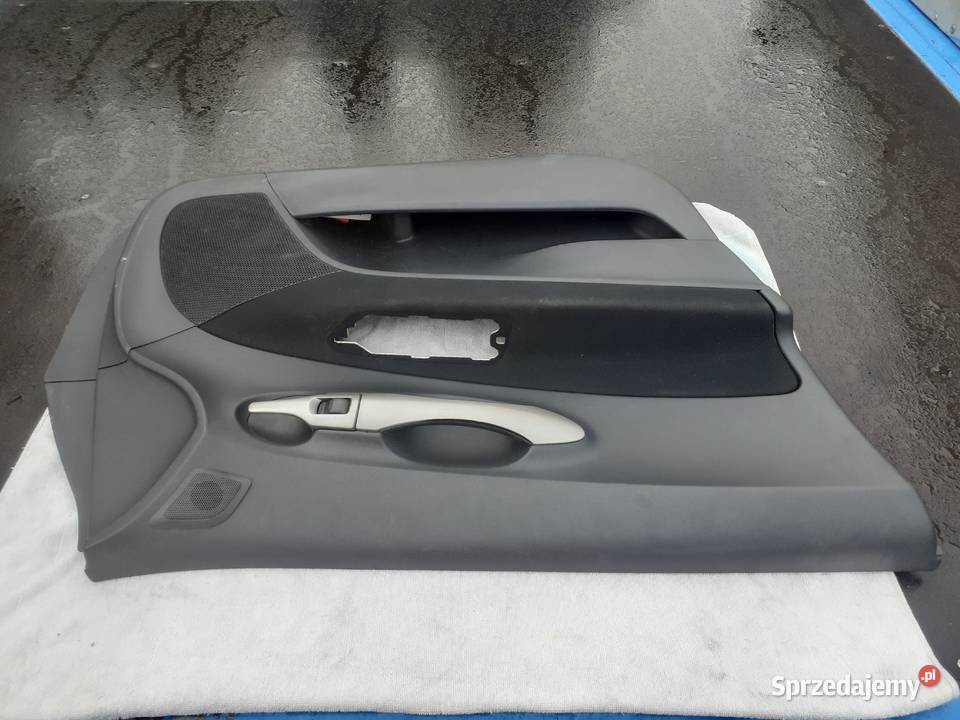 Toyota Auris 1 boczek drzwi lewy