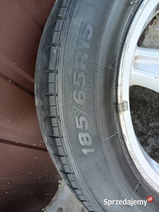 Felgi aluminiowe z oponami Opel 18565 R15 sprzedam