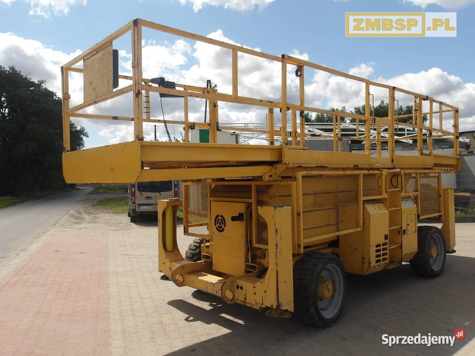 Podnośnik nożycowy spalinowy 4x4 Genie GS4390 RT Dźwigi, podnośniki Pleszew