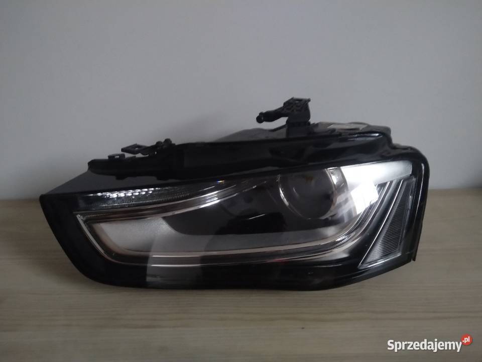 Audi A4 reflektor lampa lewy przód lift bi Xenon osobowe