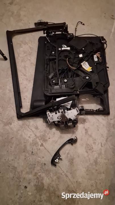 PODNOŚNIK SZYBY LEWY TYLNY DODGE GRAND CARAVAN łódzkie Łódź sprzedam