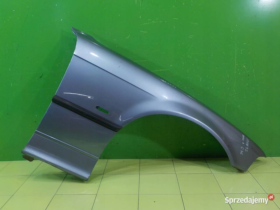 BMW 3 E36 19 B 1997r COUPE 2D blotnik prawy osobowe Błotniki Suków