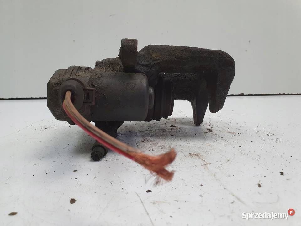 Audi A4 B8 TYLNY ZACISK HAMULCOWY prawy tył Rudka