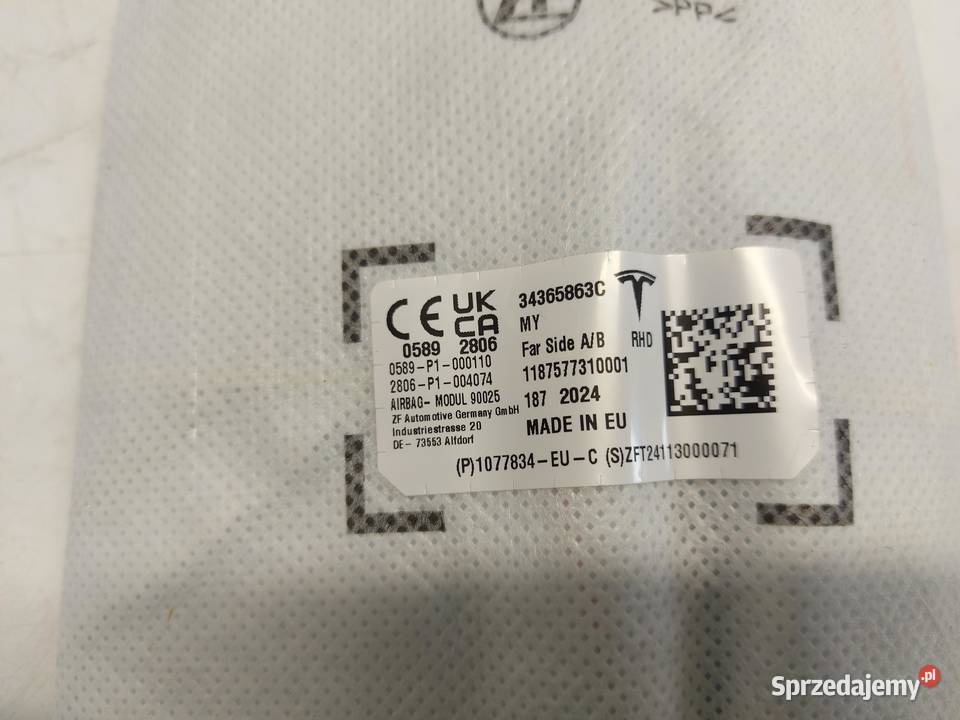 TESLA MODEL Y 2024r PODUSZKA FOTELA PRAWA sprzedam