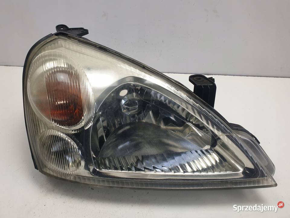 LAMPA PRAWA Suzuki Liana PRZEDNIA przód EUROPA Lampy przednie Chełm